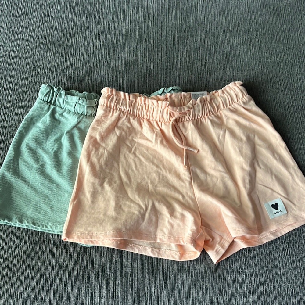 2 kids cloth shorts in orange and green
